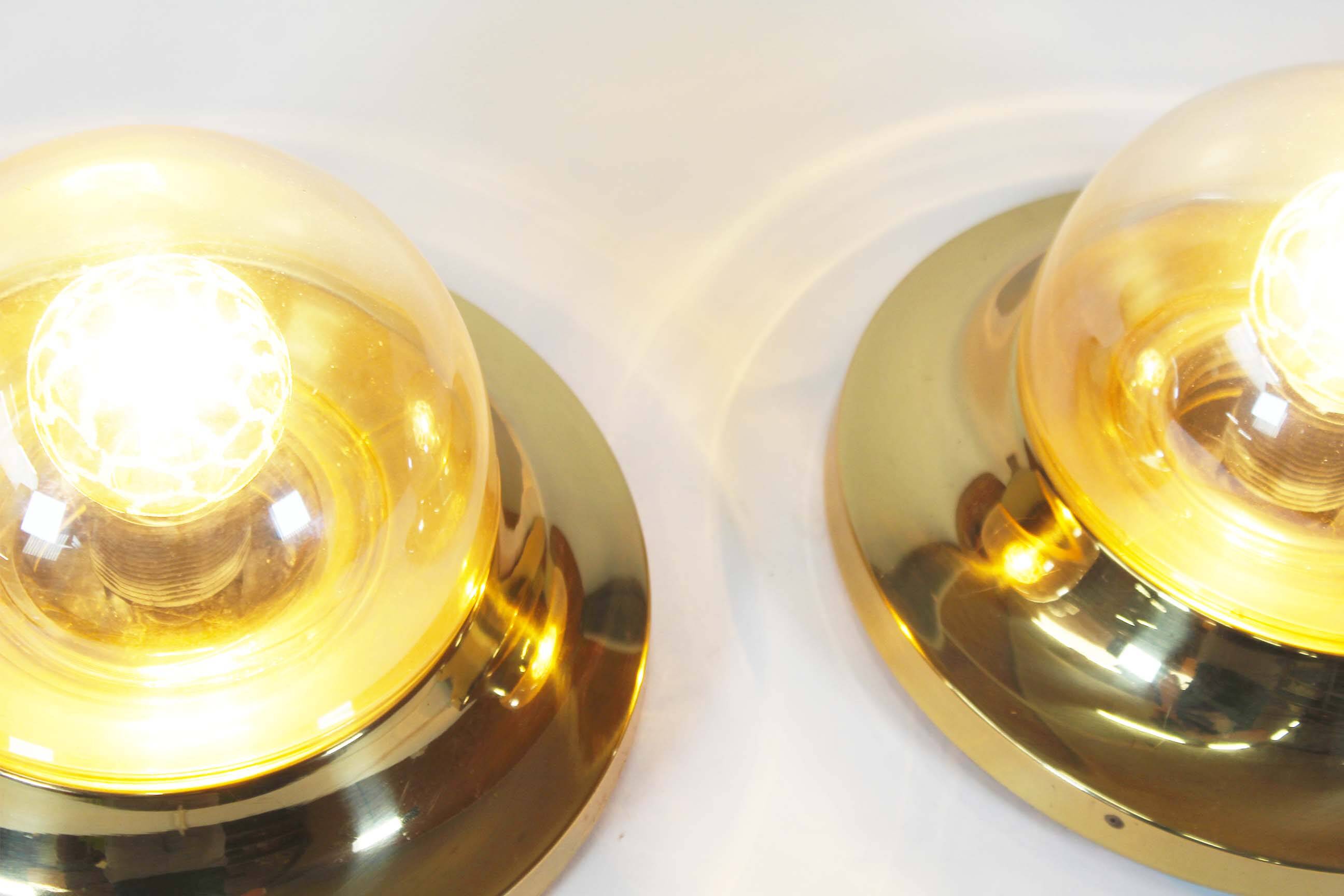 Pair of 1970’s petite brass & glass wall lights