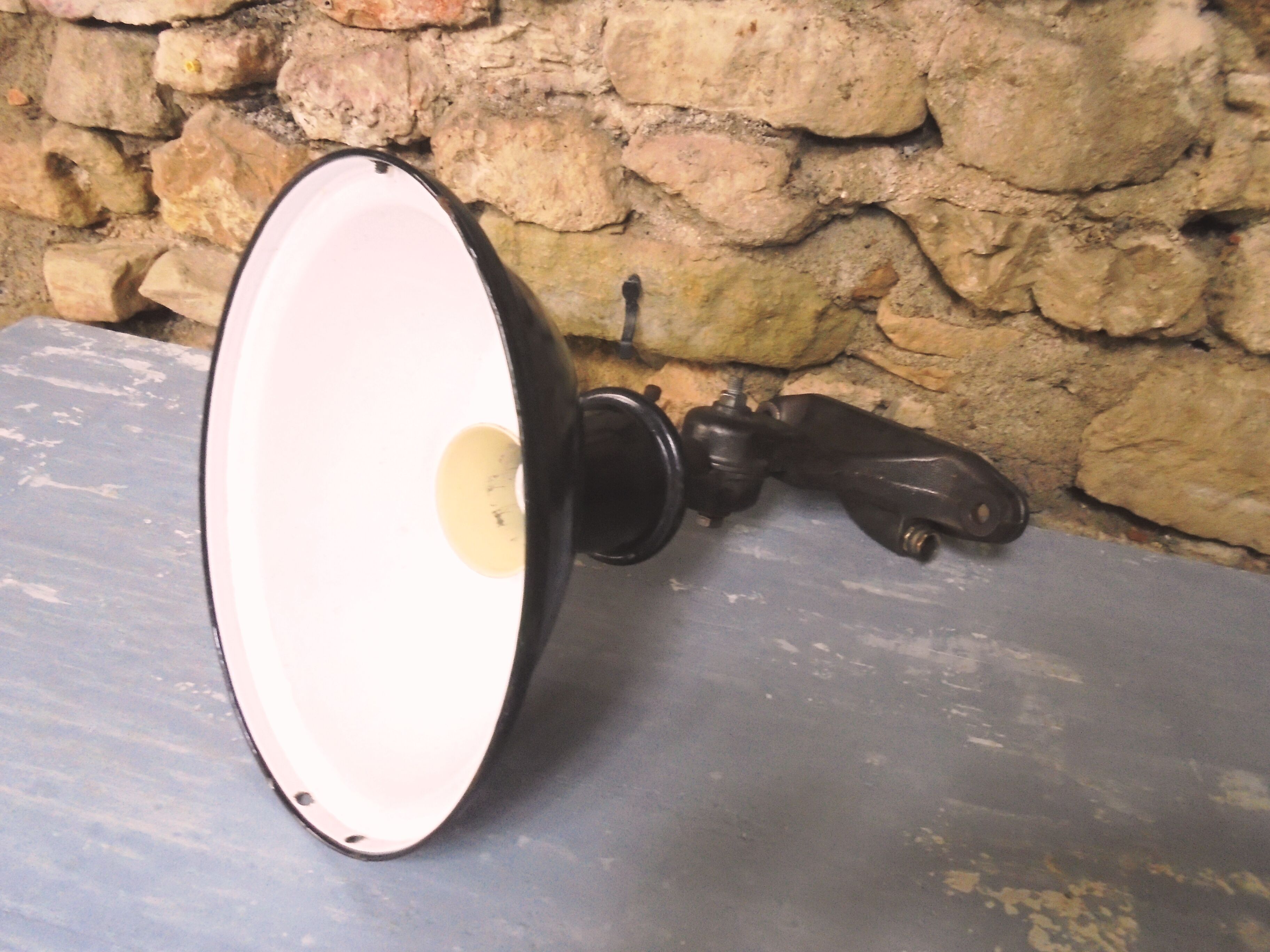 Antique cast iron and enamel wall lamp from the 1930s