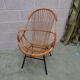 Fauteuil rotin pied métal années 60