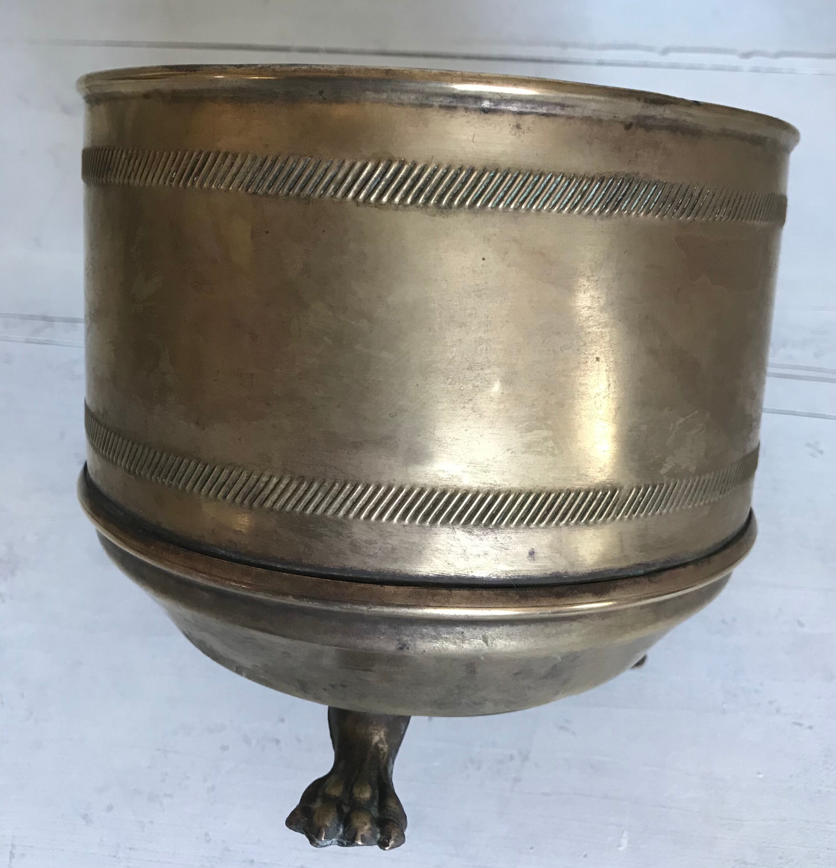 Former brass tripod pot