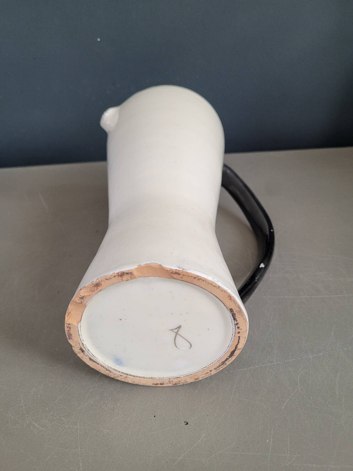 Vintage black and white diabolo pitcher