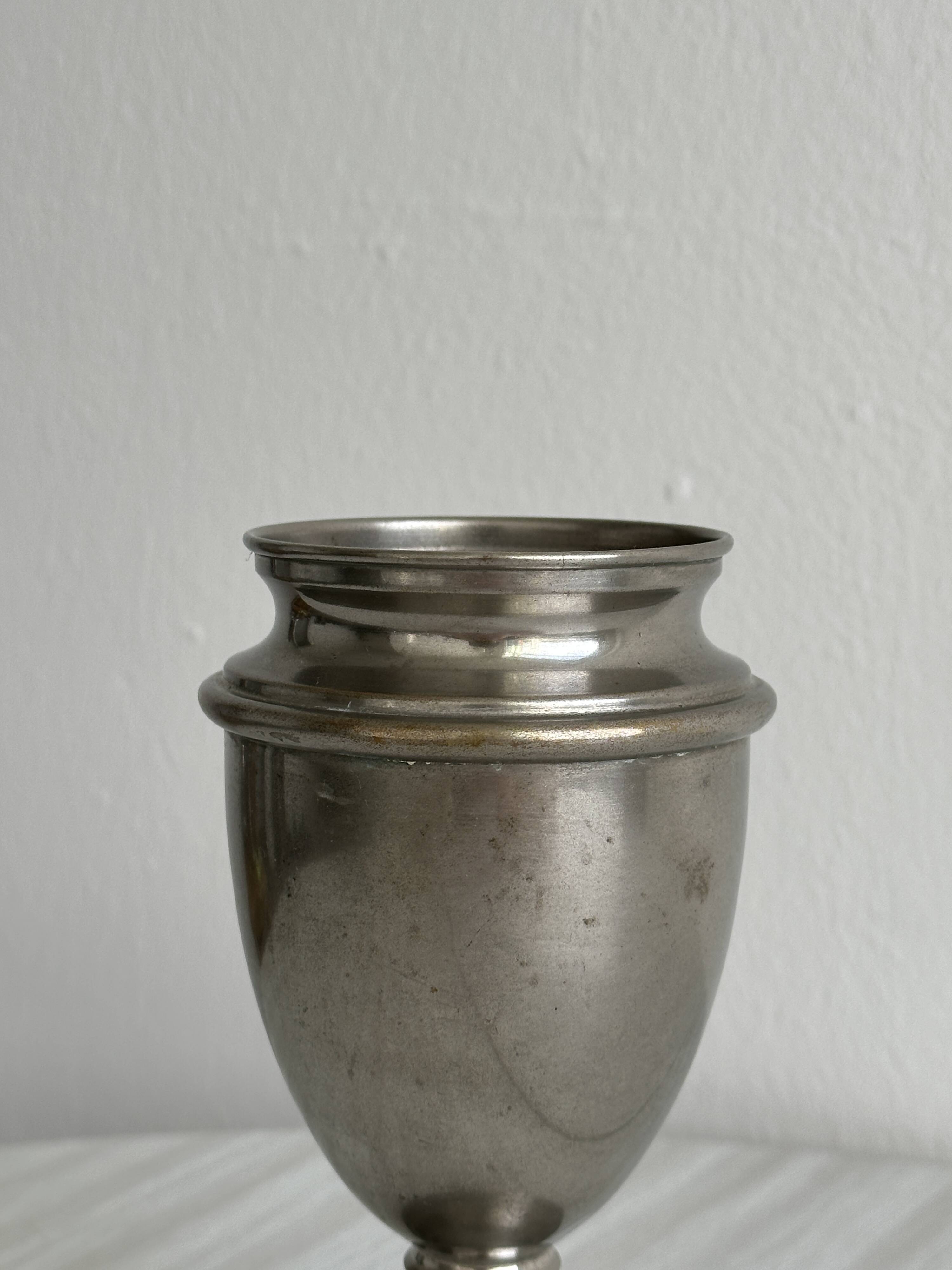 Vintage patinated tin vase