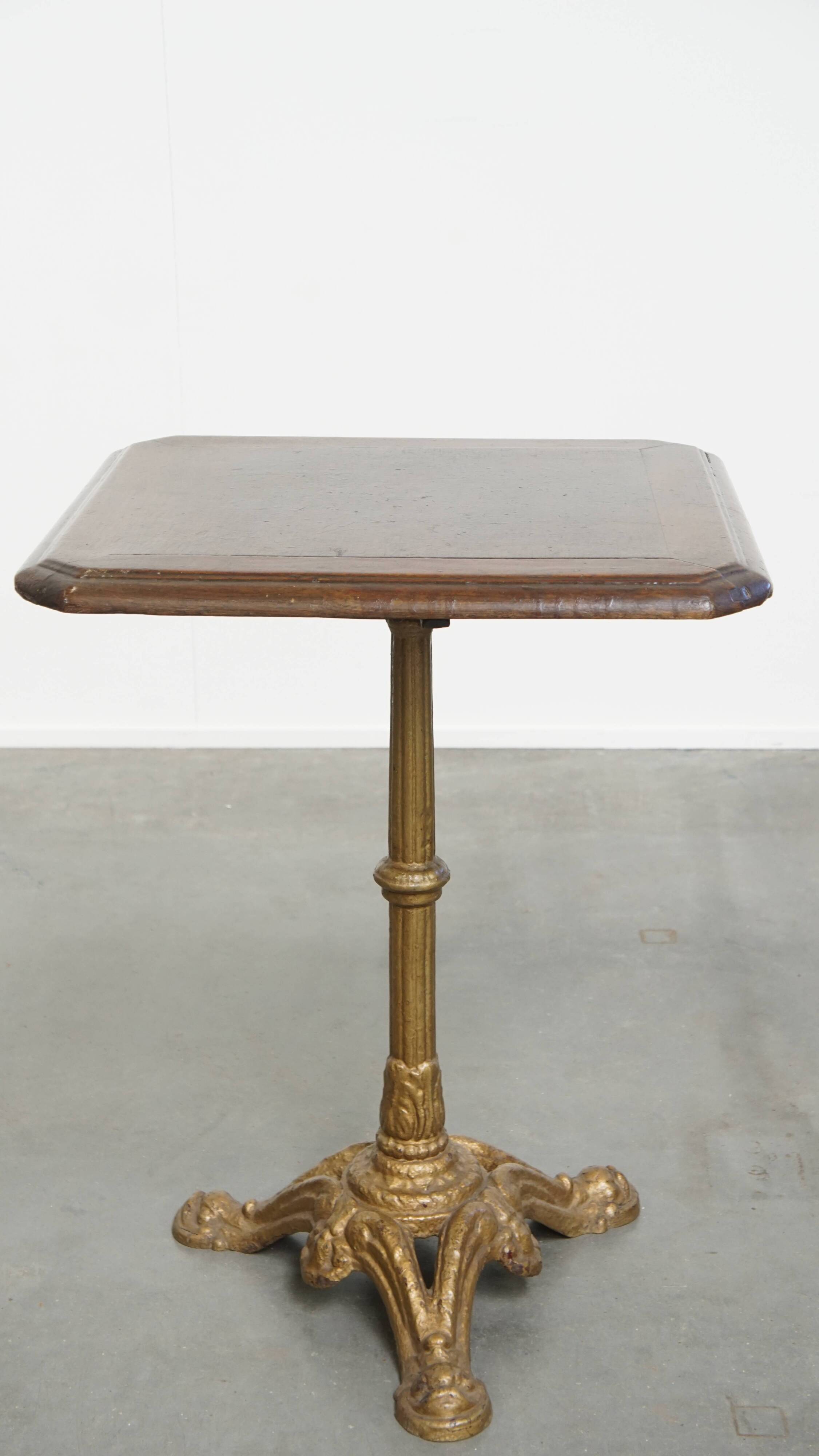 Antique Bistro Table with Gold-Colored Cast Iron Base and Dark Oak Top