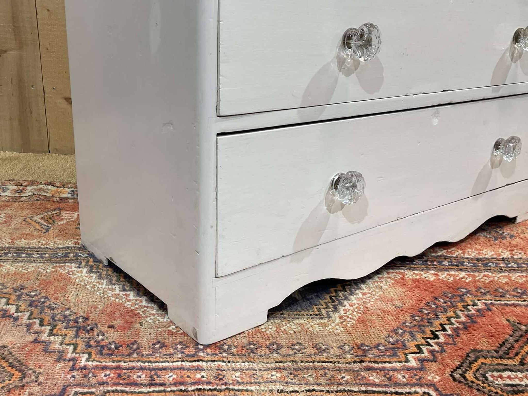 English chest of drawers painted in fir with glass knobs, 19th century