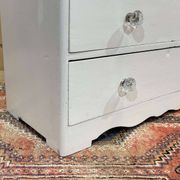 English chest of drawers painted in fir with glass knobs, 19th century