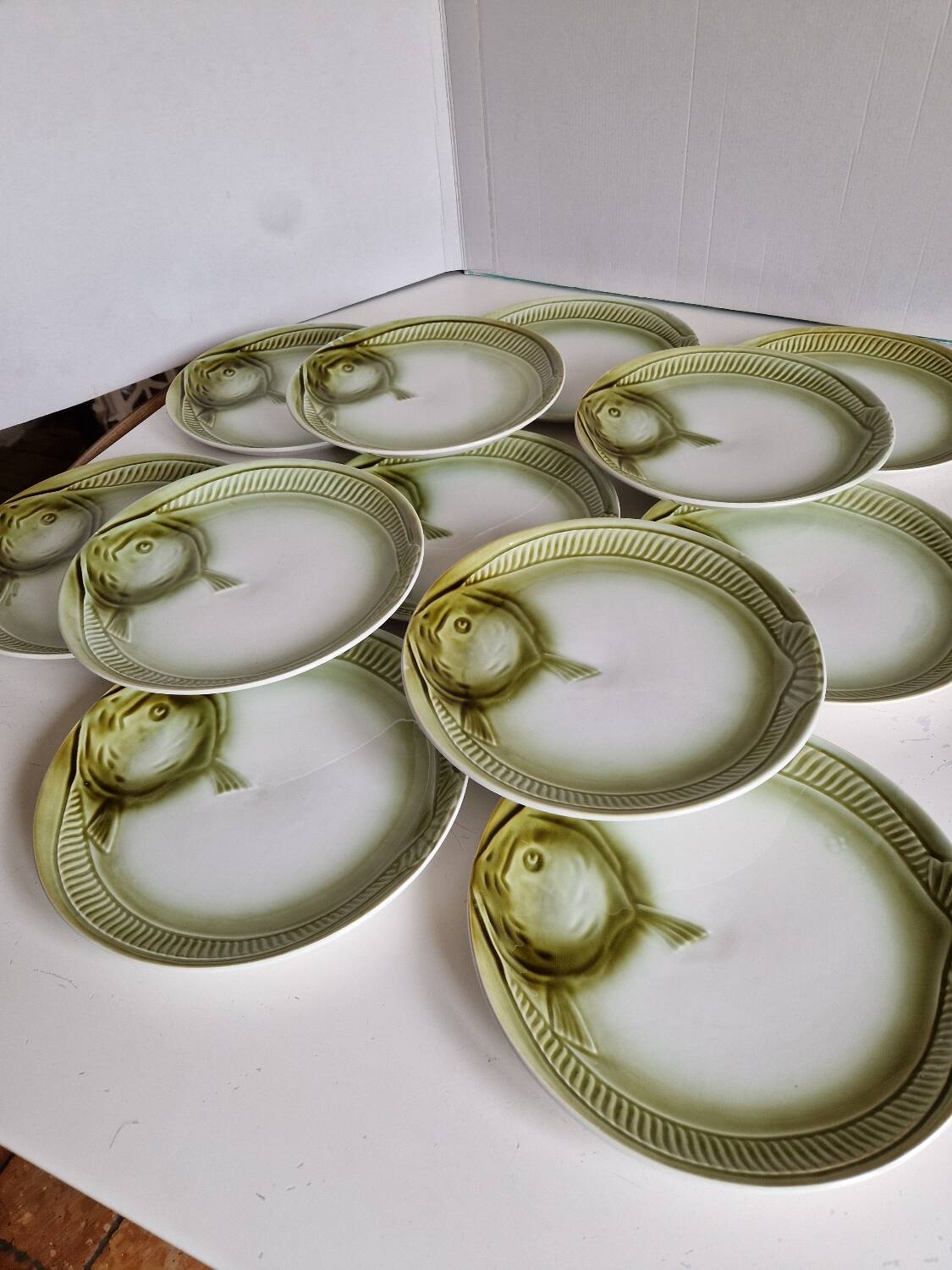 Set of 12 fish plates from the Moulin des Loups factory in Orchies