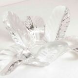 Empty floral pocket crystal of transparent arques signed