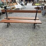Antique double garden bench from the city of Paris in cast iron and wood