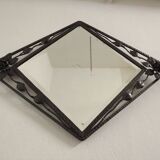 Bevelled wrought iron mirror