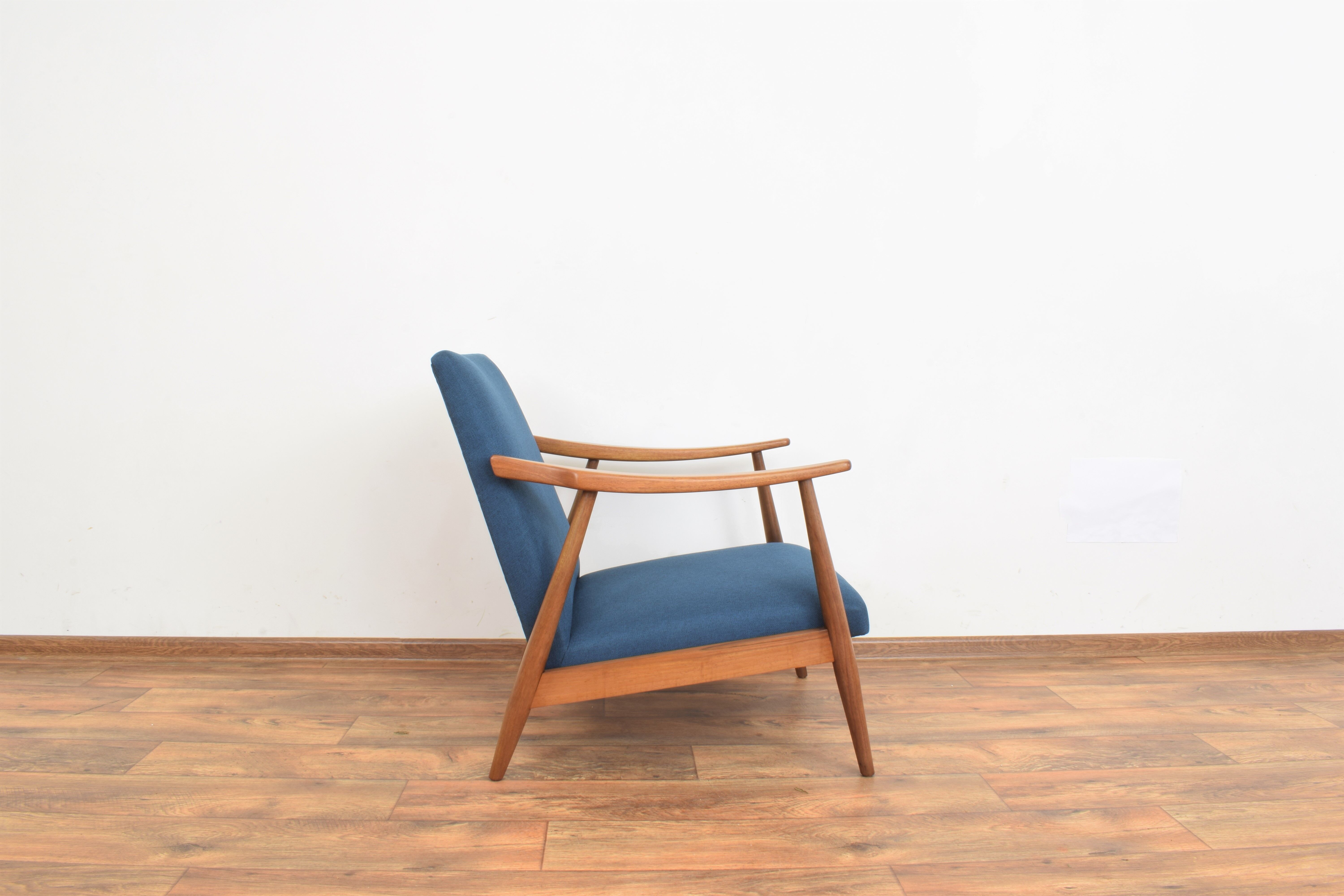 Teak desk and walnut armchair