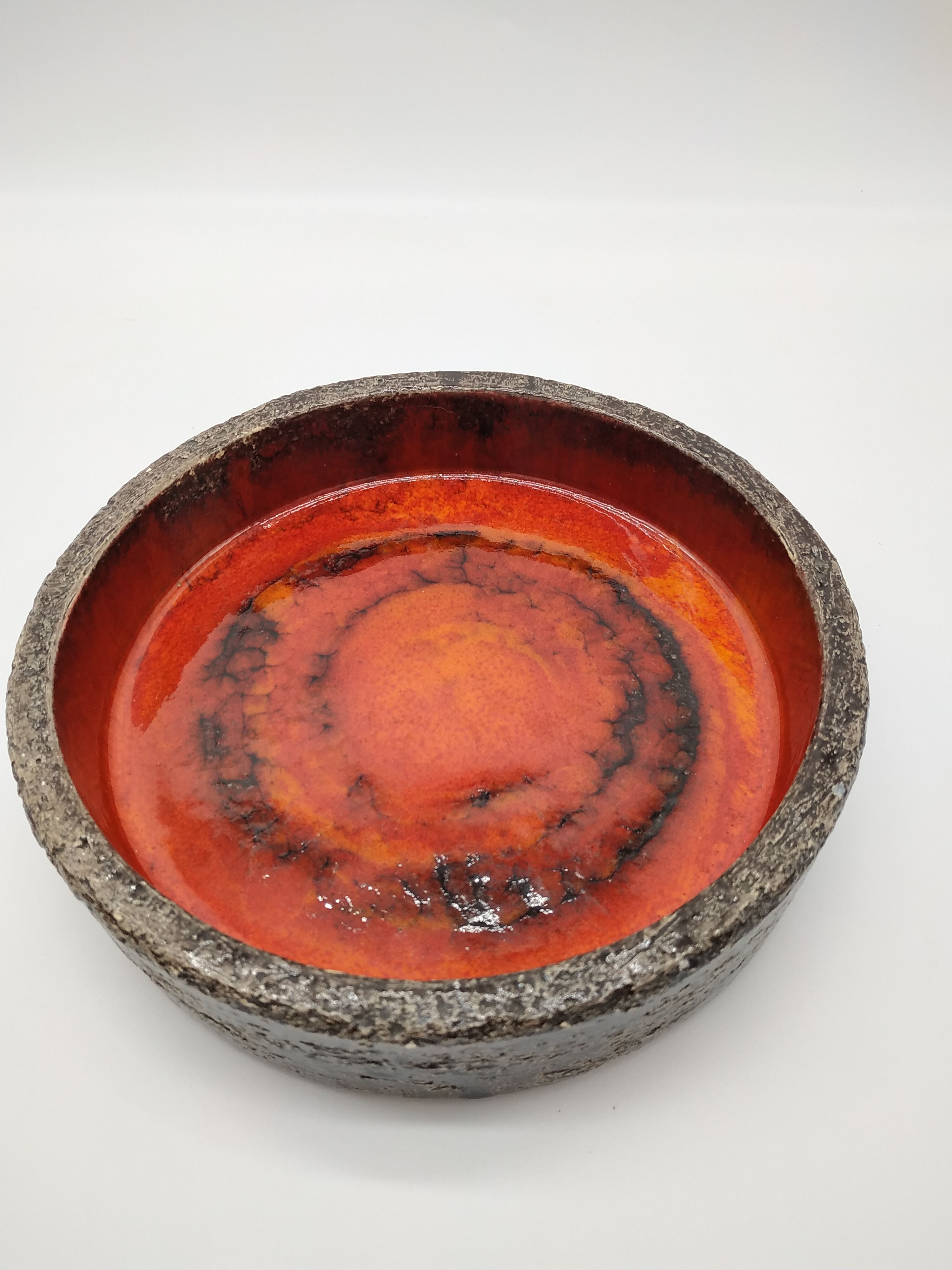 Brutalist cut in orange and red enamelled sandstone