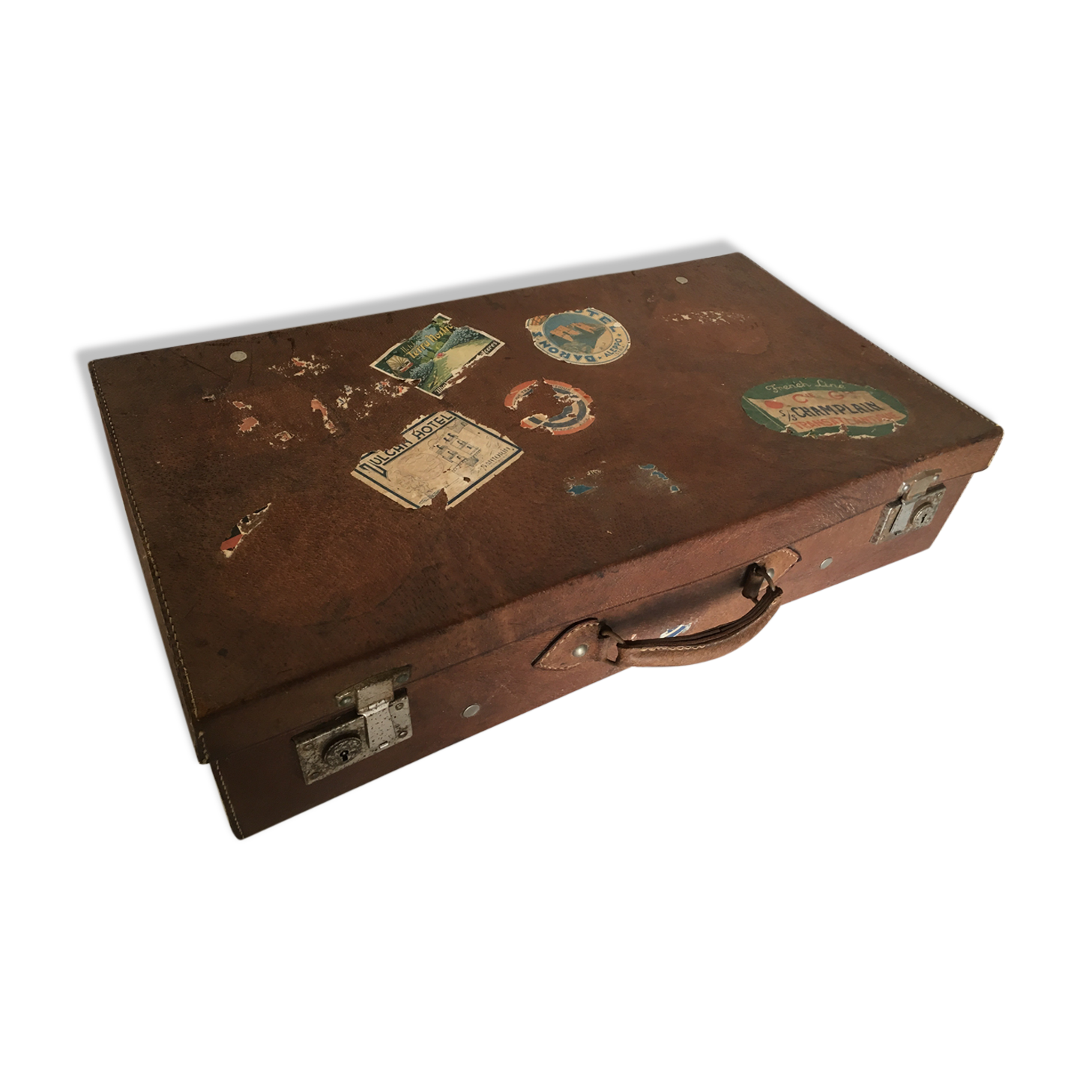 Suitcase of leather with labels of palaces