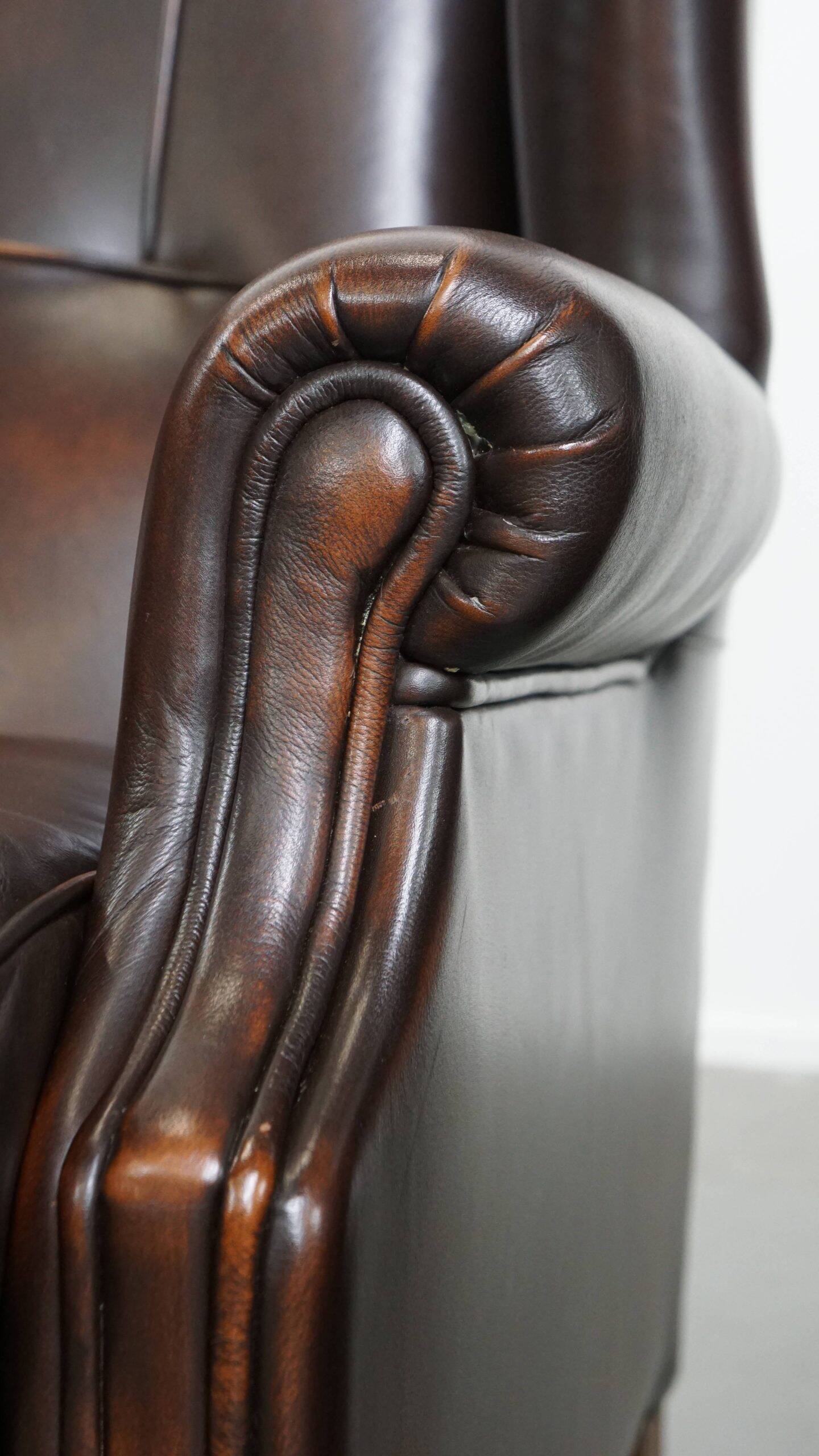 Comfortable and very beautiful set of 2 cow leather wingback armchairs in English style