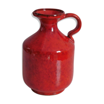 Pitcher in red ceramic signed.