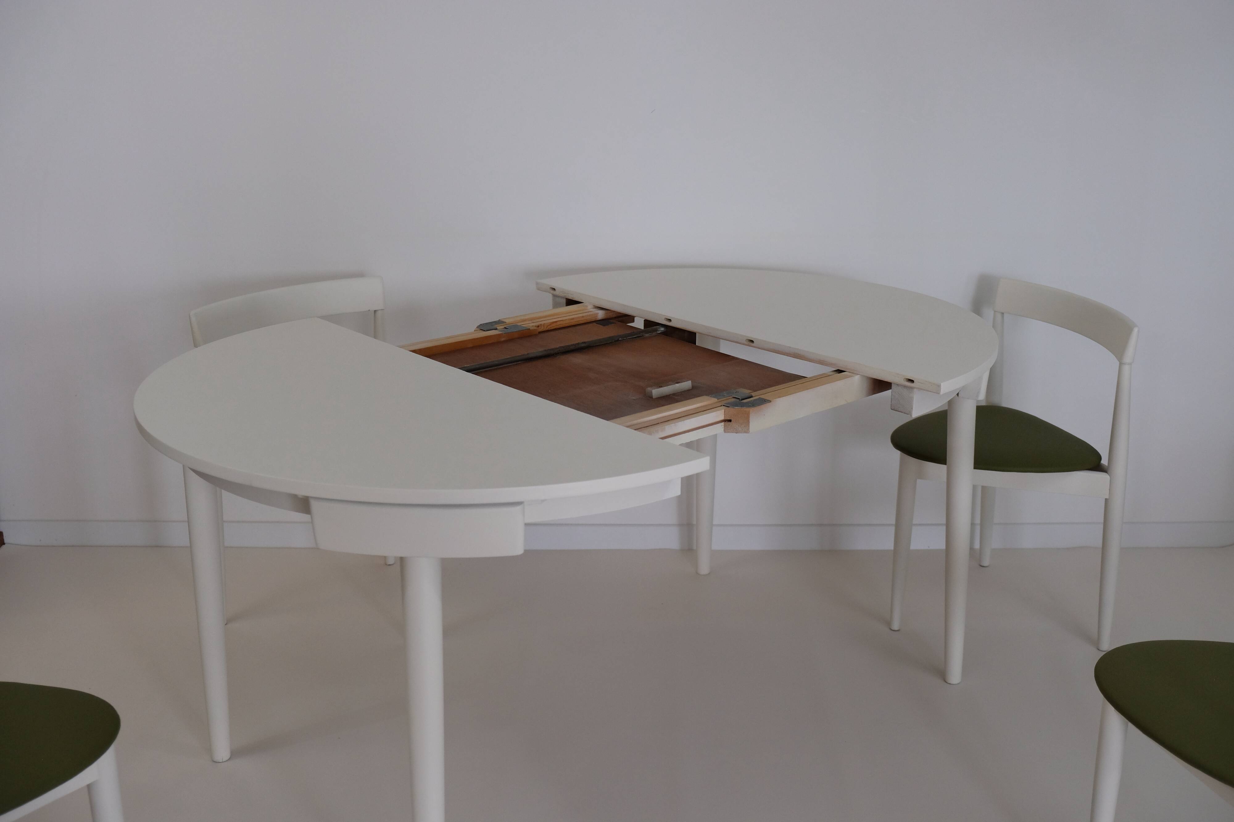 Table and chairs by Hans Olsen