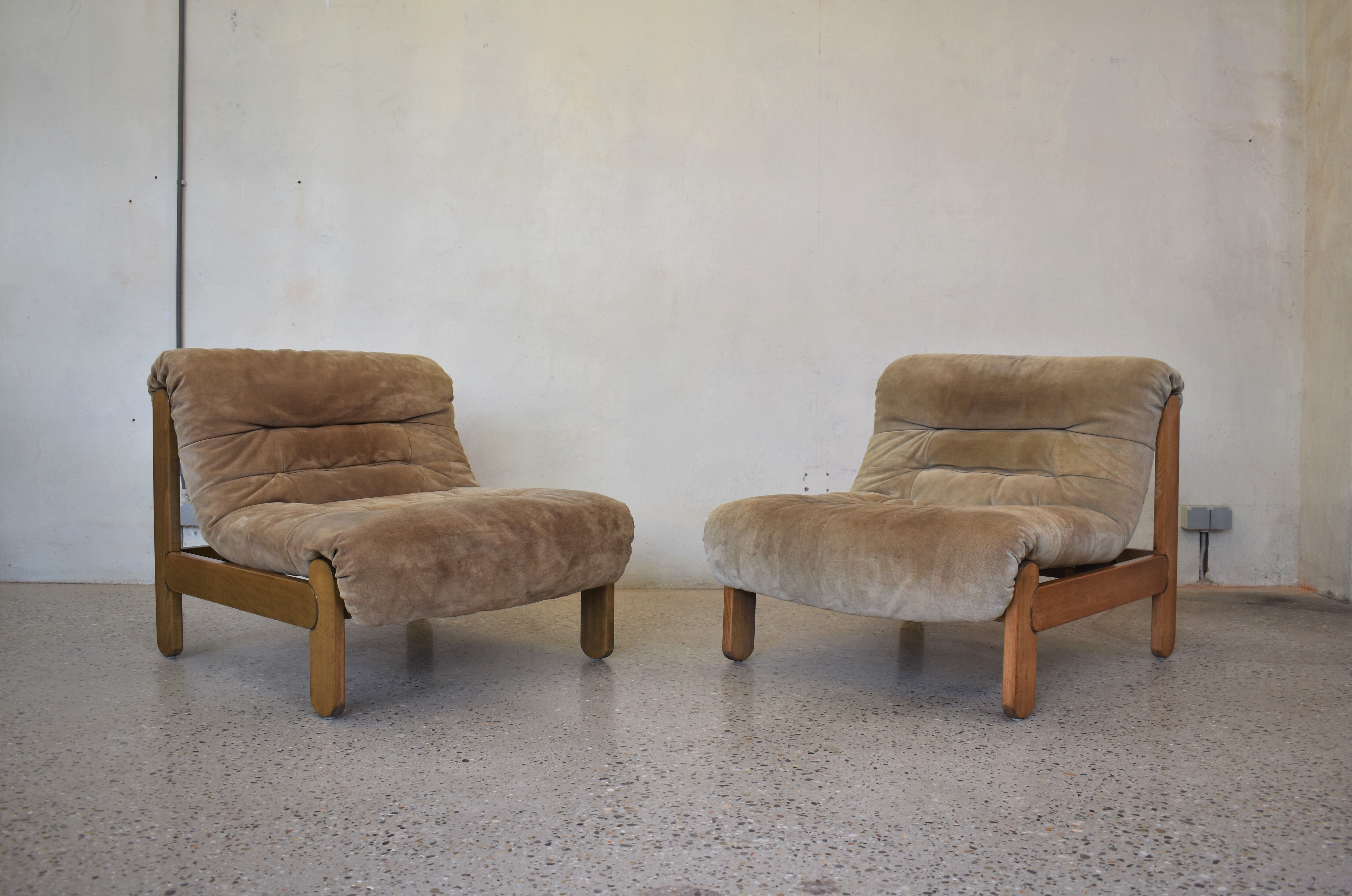 Pair of wild leather lounge chairs