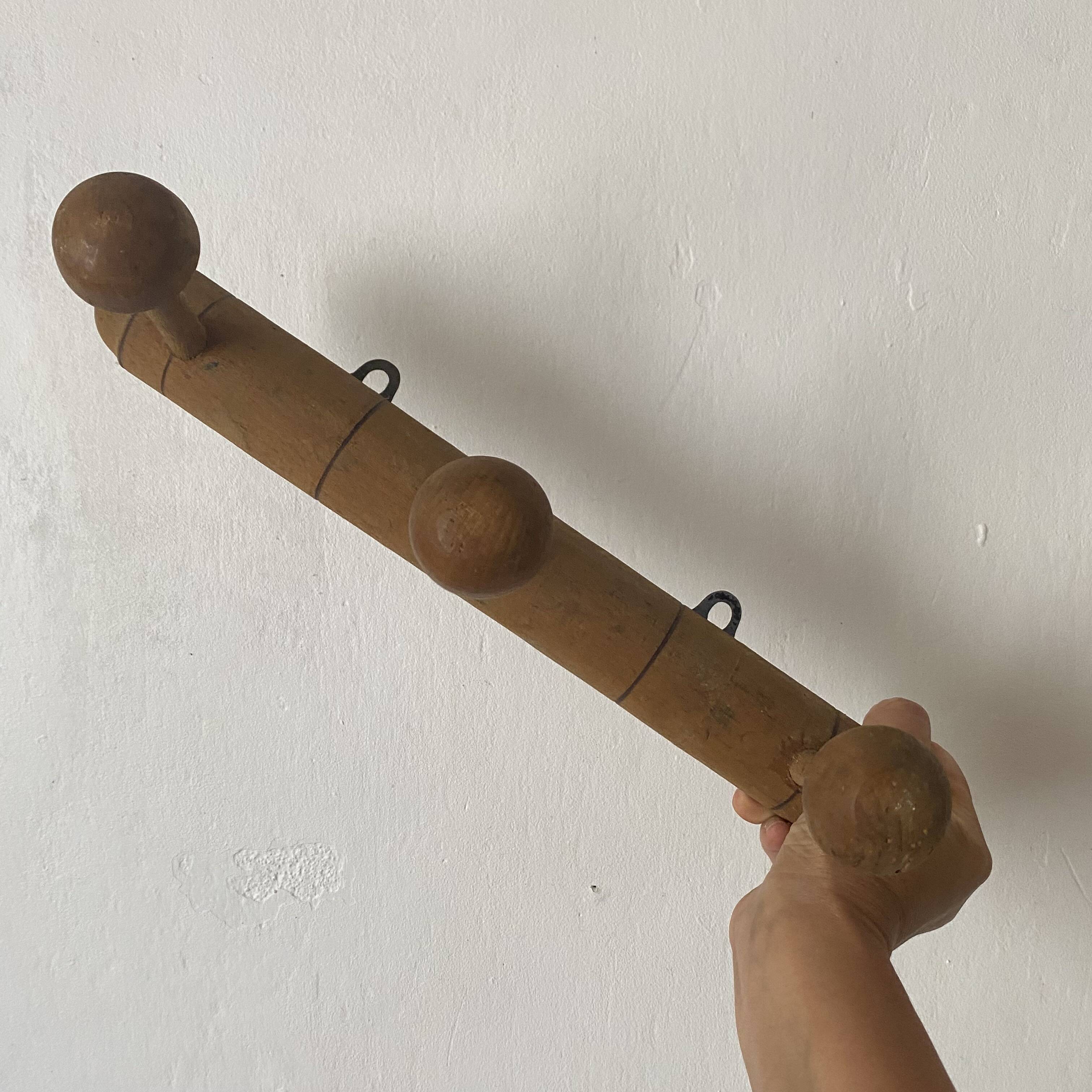 Natural wood wall coat rack