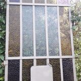 Workshop door 258,4x98,5cm in iron and colored cathedral glasses