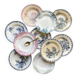 10 mismatched vintage soup plates in blue, green, and red ironstone