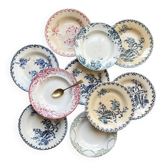 10 mismatched vintage soup plates in blue, green, and red ironstone