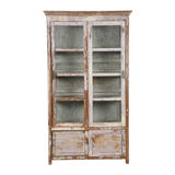Display case with sliding doors in patinated wood