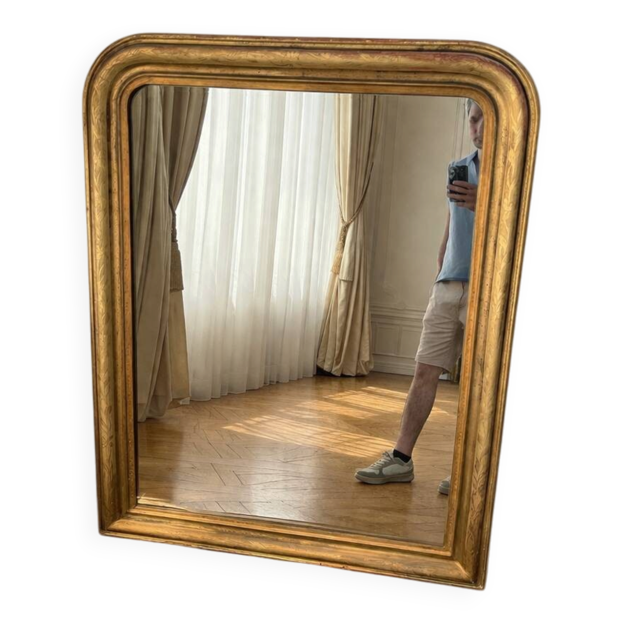 Large Louis-Philippe gilded mirror with gold leaf