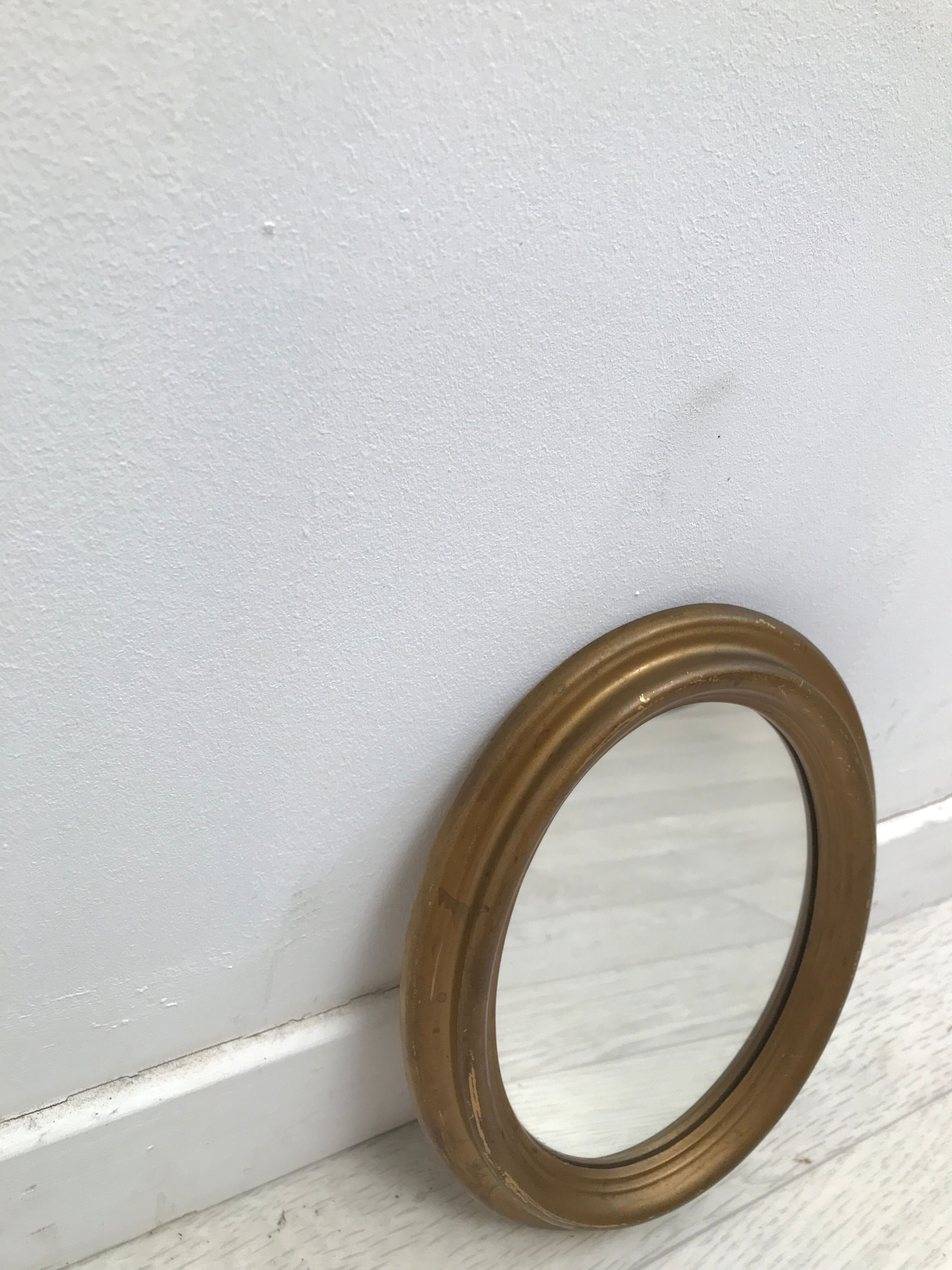 Vintage old bevelled oval mirror