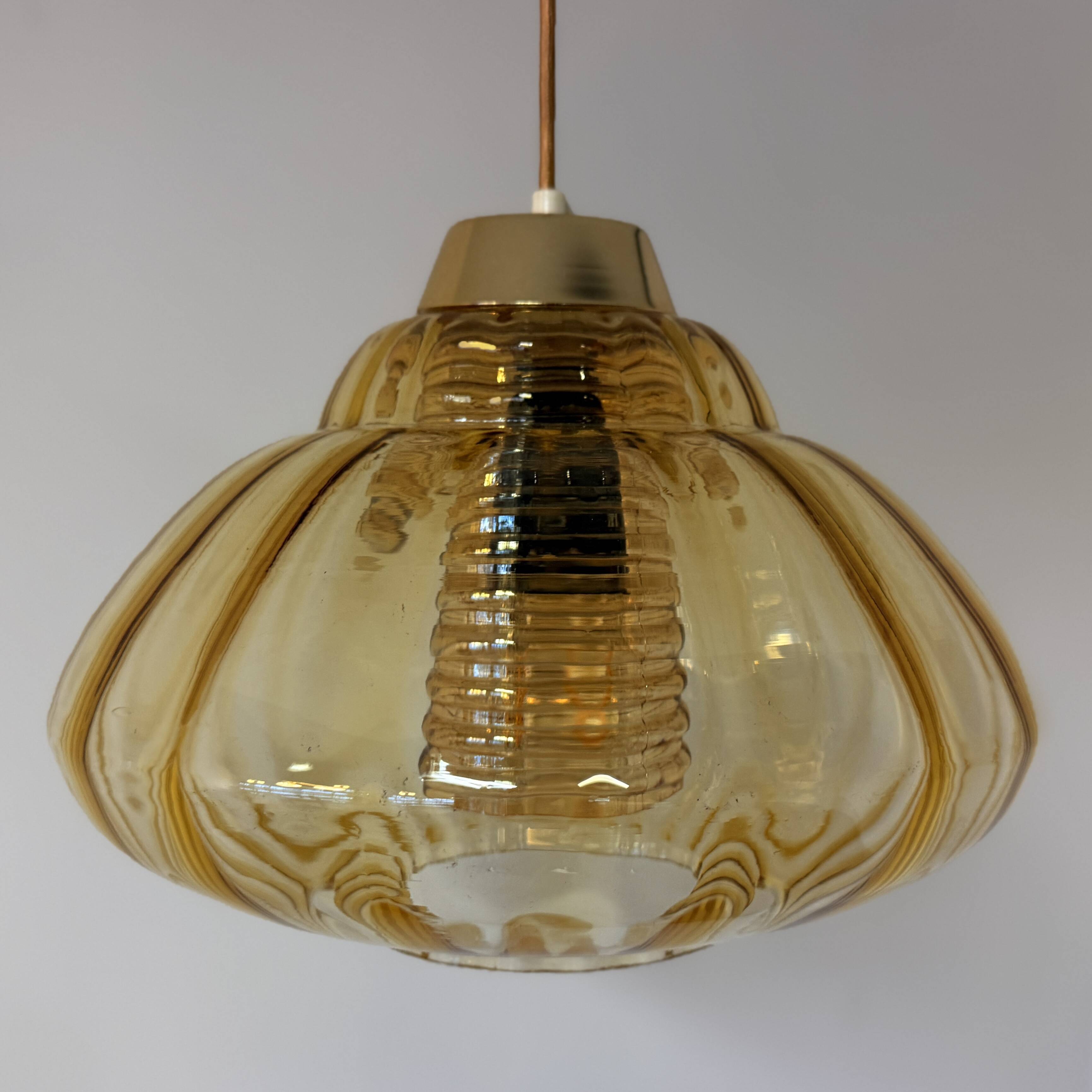 Vintage pendant lamp with amber glass shade
