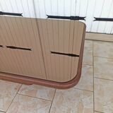 Table basse design en cuir et plateau en verre