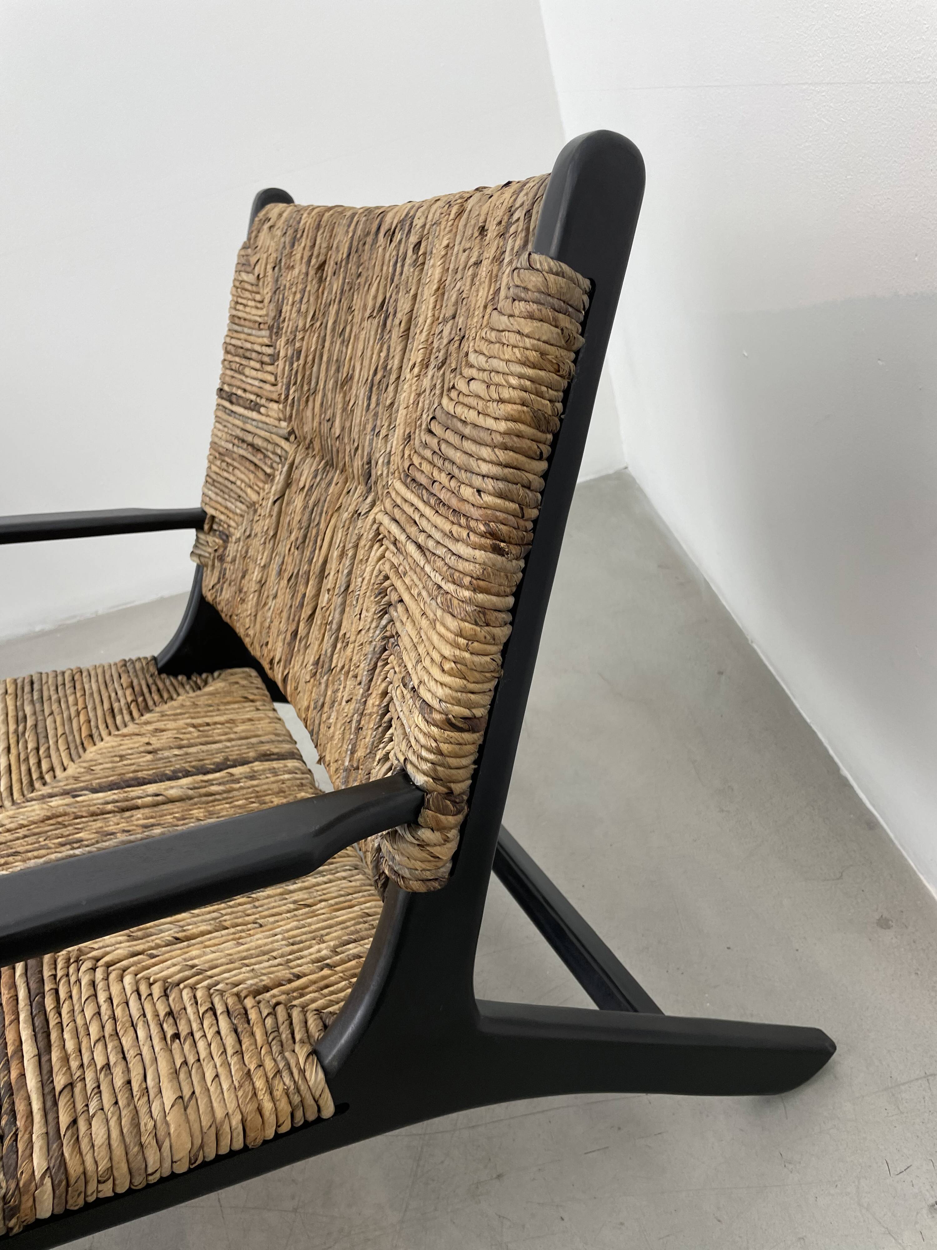 Pair of armchairs by Olivier de Schrijver in wild straw