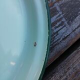 Mint green cocotte in enamelled sheet metal