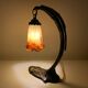 Bronze eagle lamp patinated and Art Nouveau style glass pate
