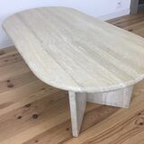 Oval coffee table in travertine