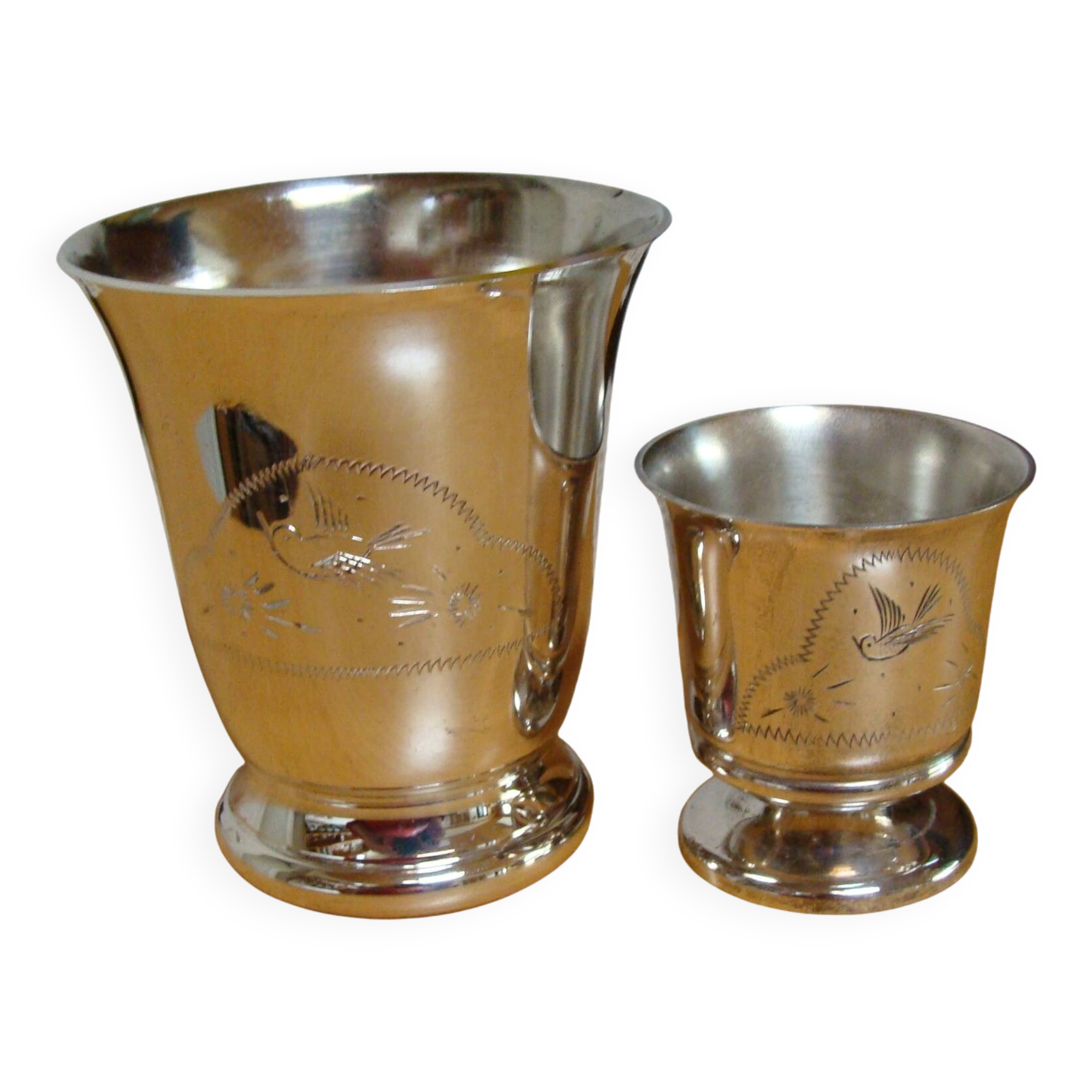 Timbale and egg cup set in silver.