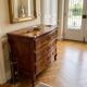 Curved commode in Louis XV style made of cherry wood.