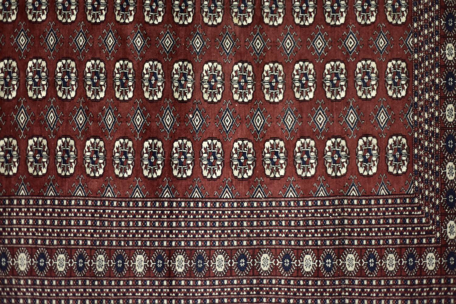 Handwoven red Boukhara oriental rug, 1960s