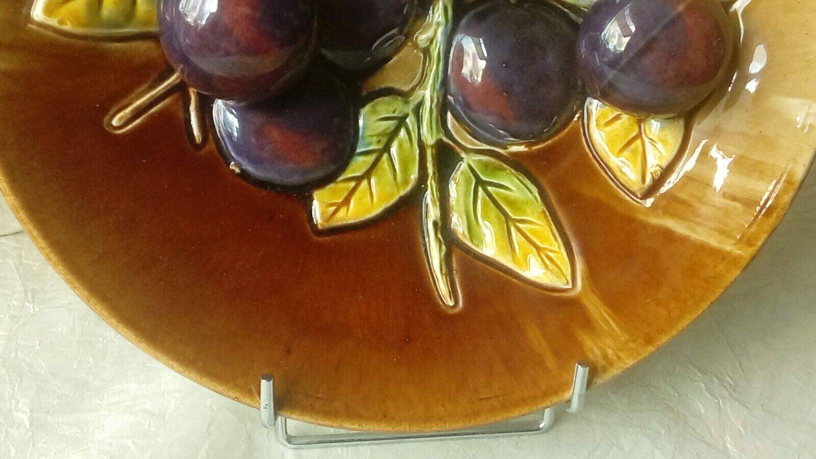 Ceramic plate barbotine trome eye plum late 19th