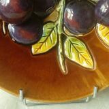Ceramic plate barbotine trome eye plum late 19th