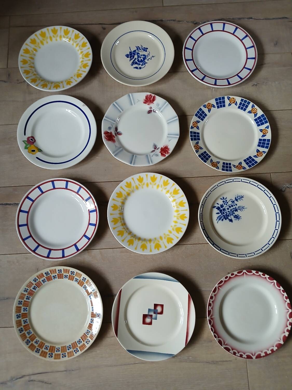 12 mismatched antique dinner plates