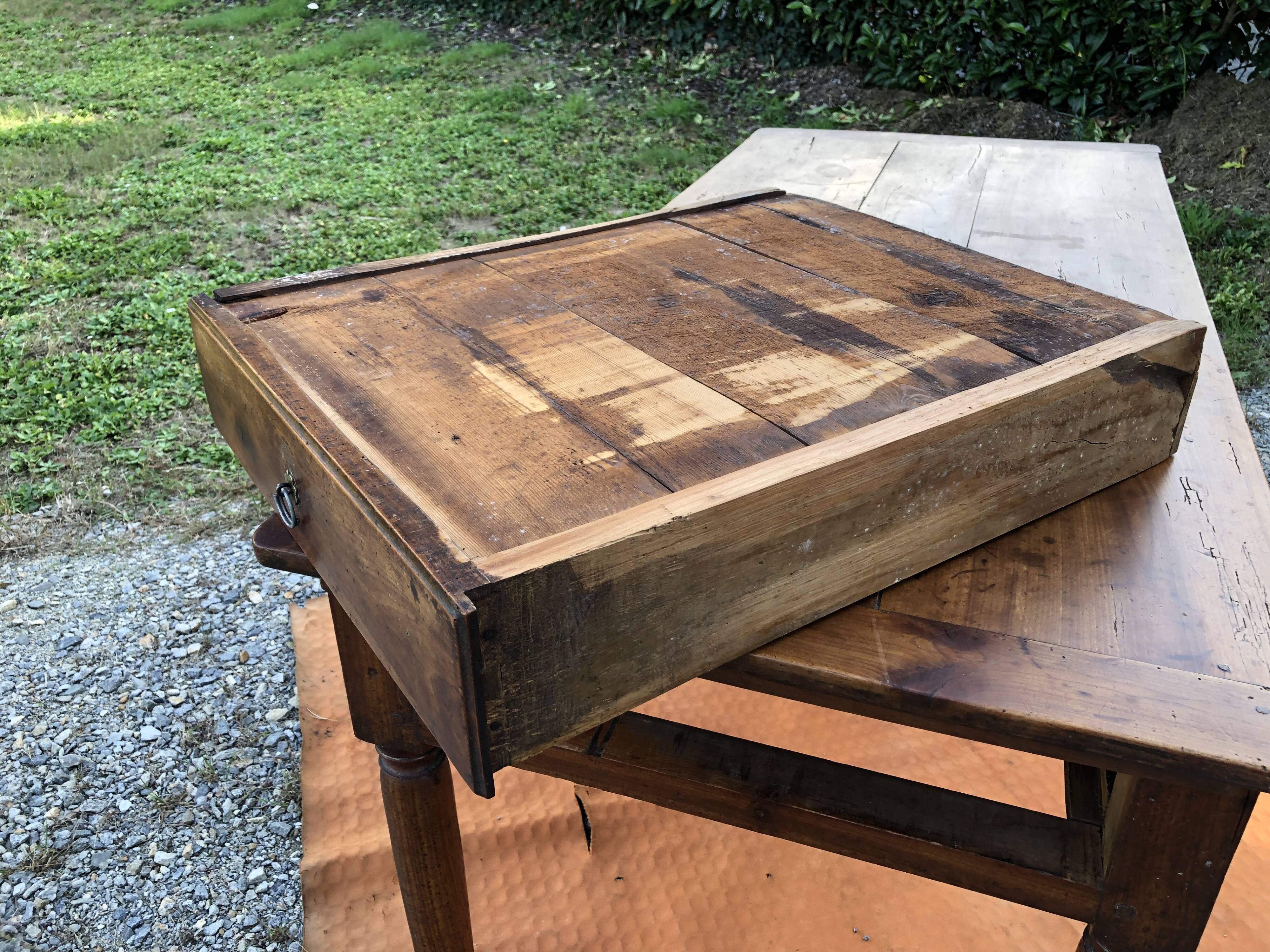 Antique cherry wood farm table with turned base with 2 drawers and 1 pull