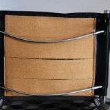 Vintage chrome and faux black leather armchair