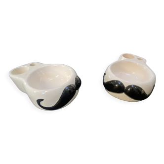 Pair of vintage whisker ashtrays