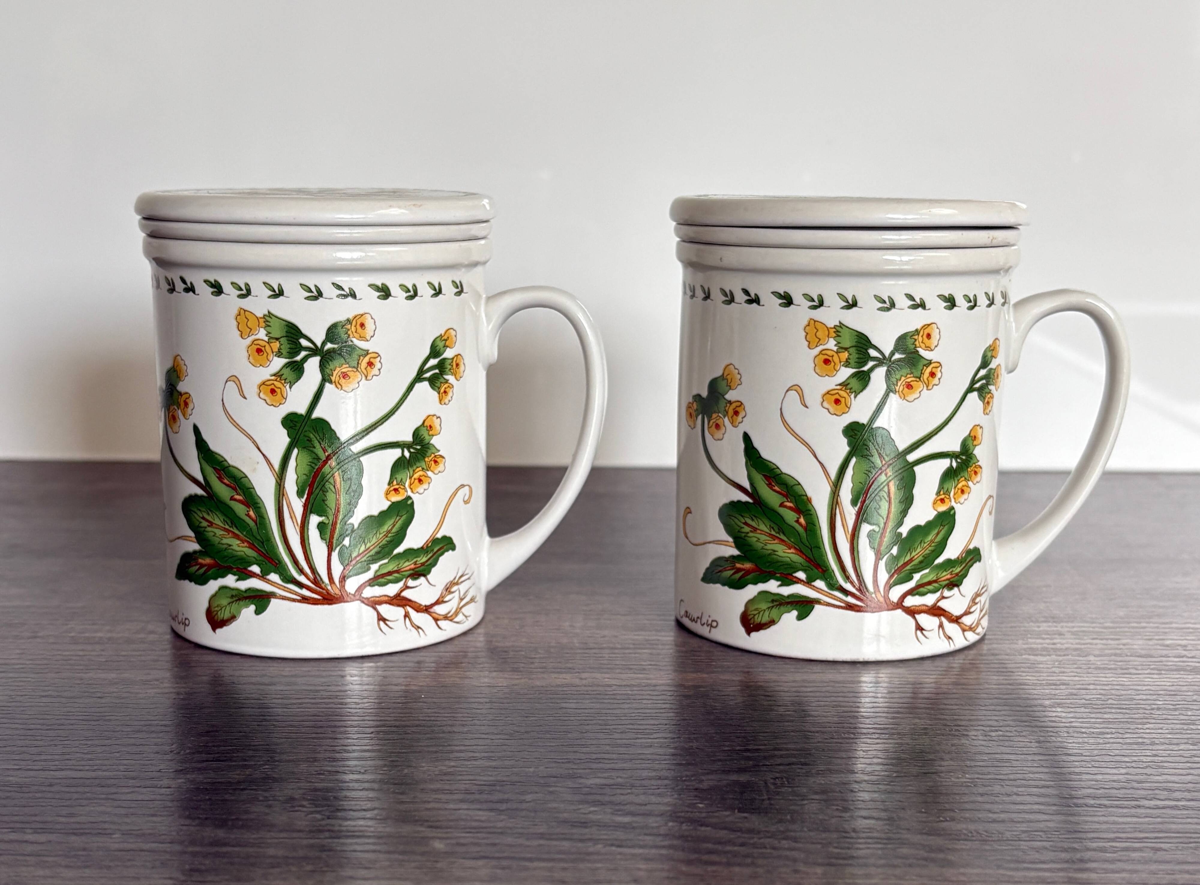Pair of vintage infusion mugs.