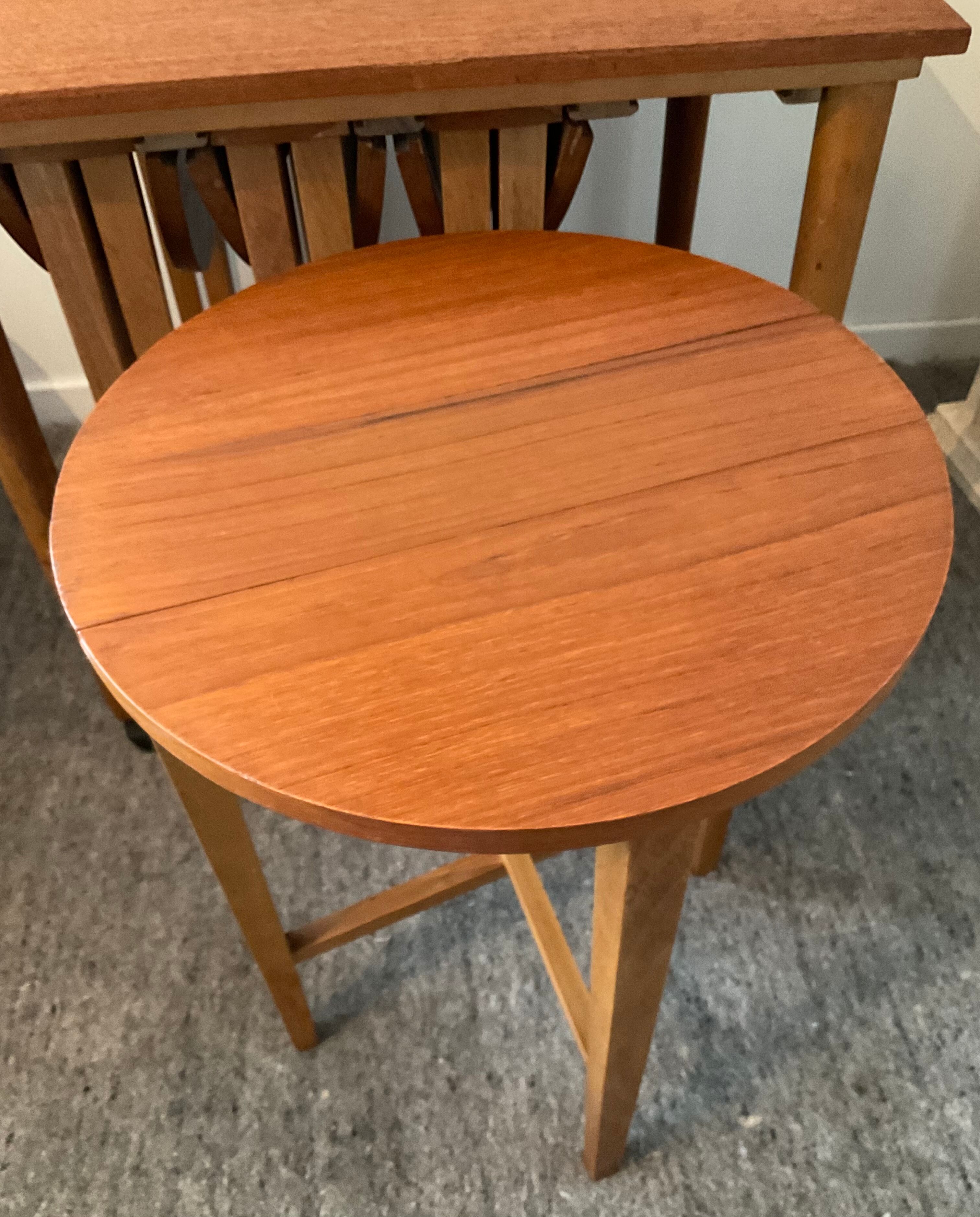 Scandinavian set by Poul Hundevad table and 4 folding teak stools