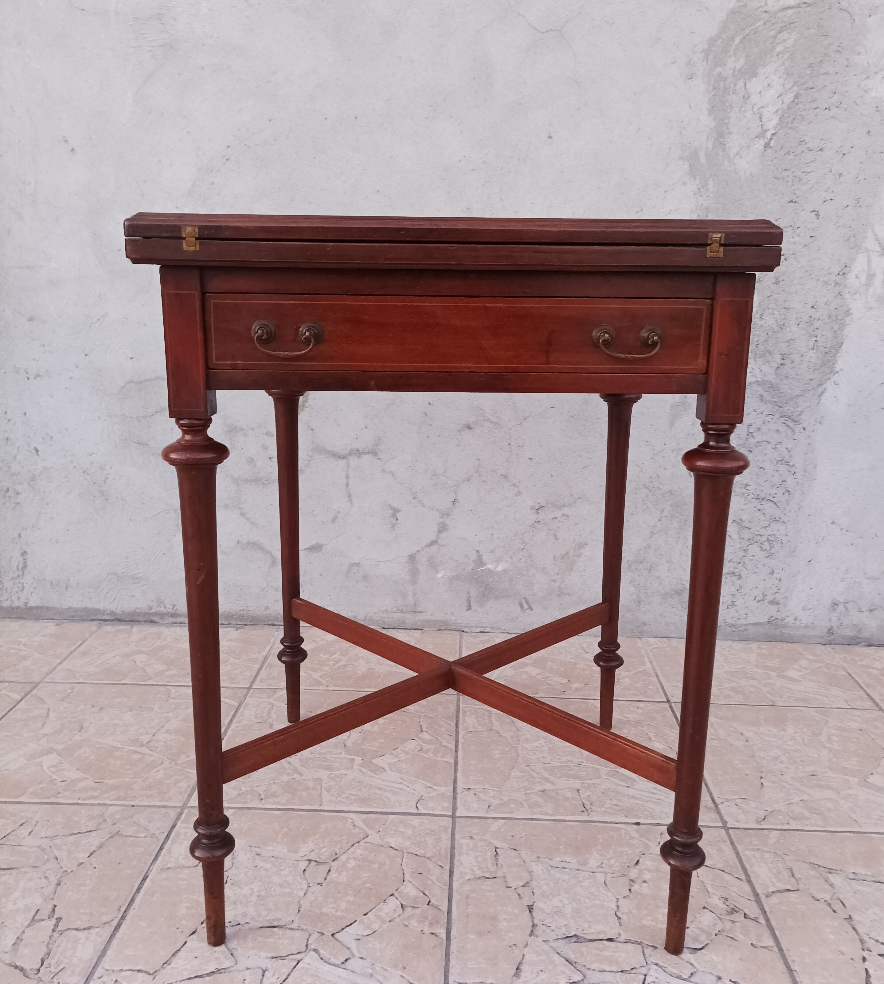 Game table in mahogany late 19th