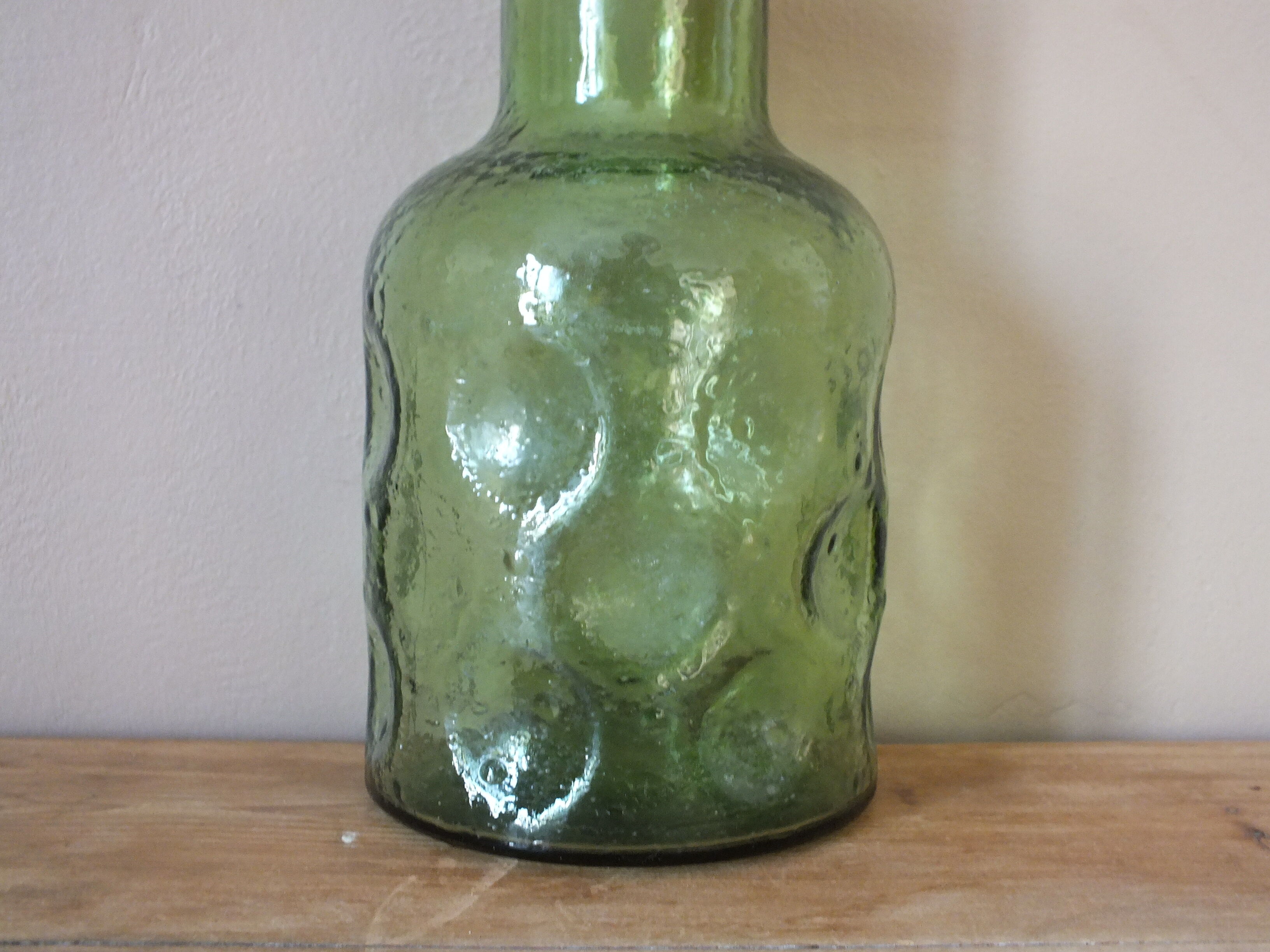 Duo of vintage bottles in Italian glass