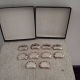 10 Christofle silver-plated knife rests