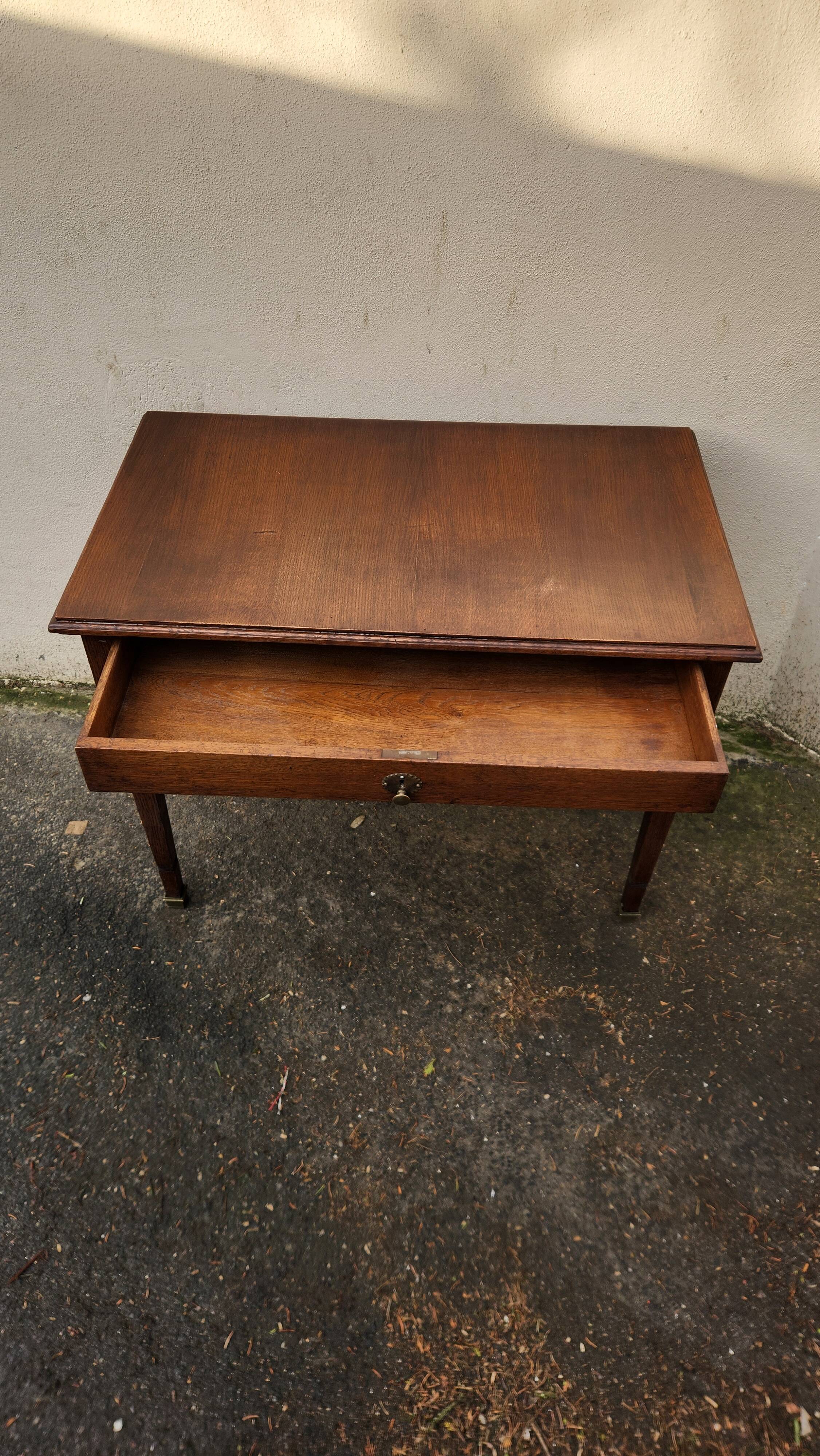 Vintage wooden desk from the 19th century, Louis XVI style.
