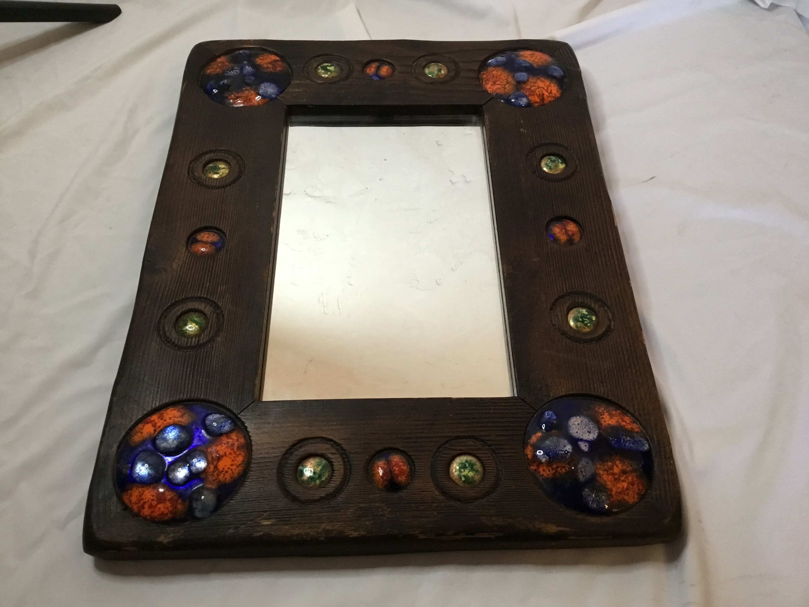 Wooden mirror with copper enamel decoration by Capo Esmaltes (Circa 1960)