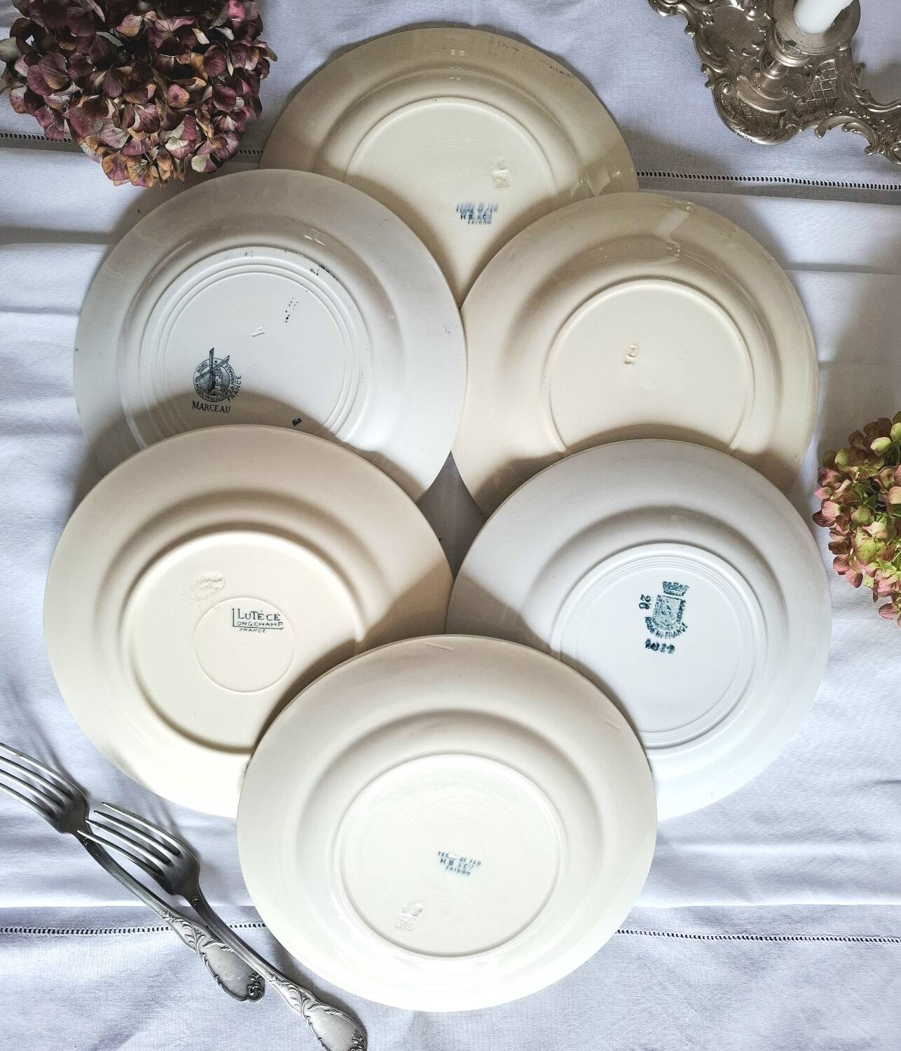 Mismatched antique ironstone dinner plates